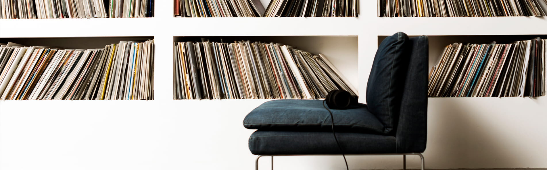Room with shelves full of records