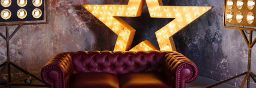 Sofa with star light behind it