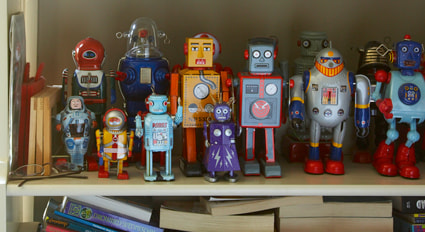 Toy robots on shelf